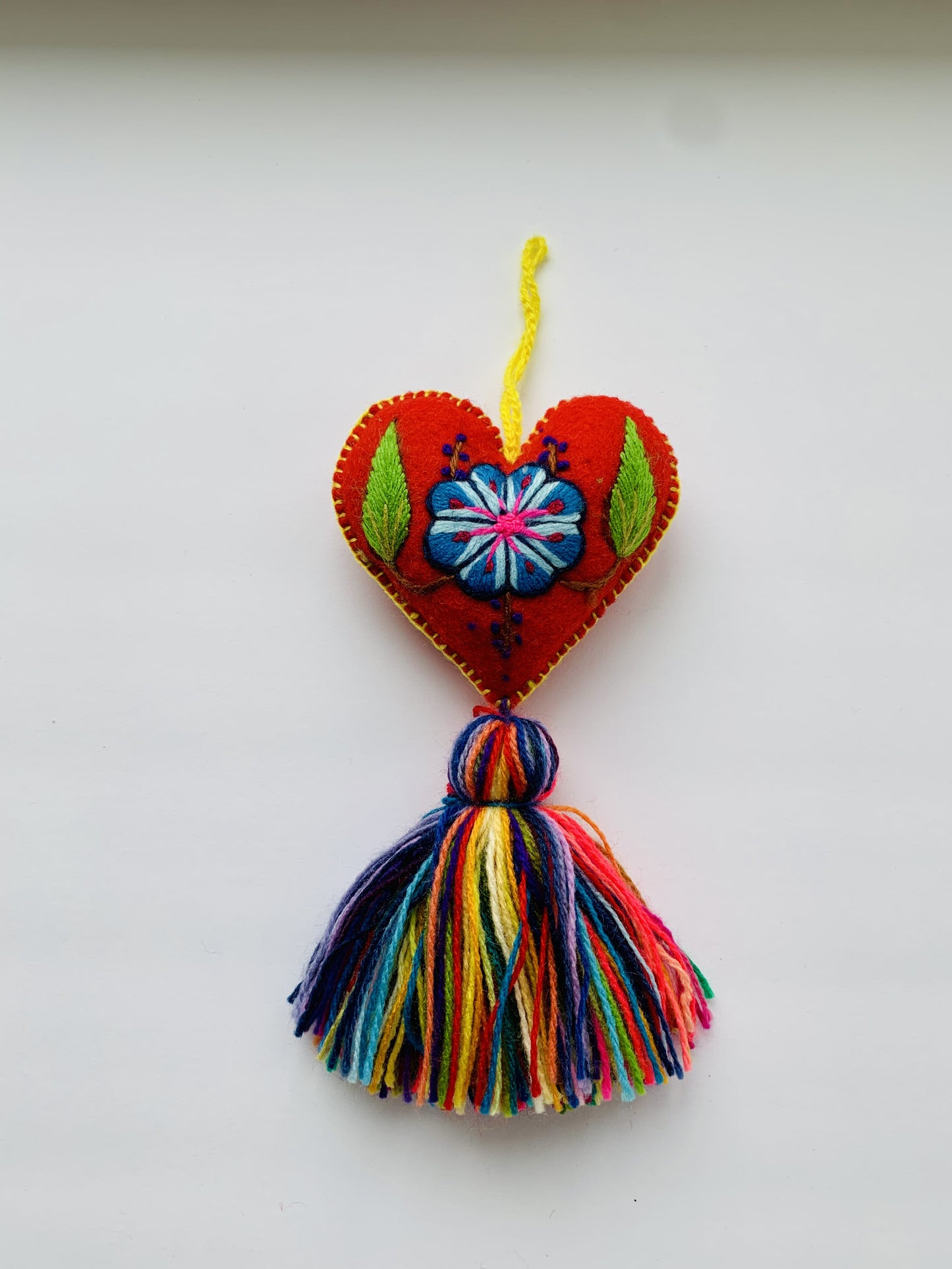 Embroidered wool heart ornament